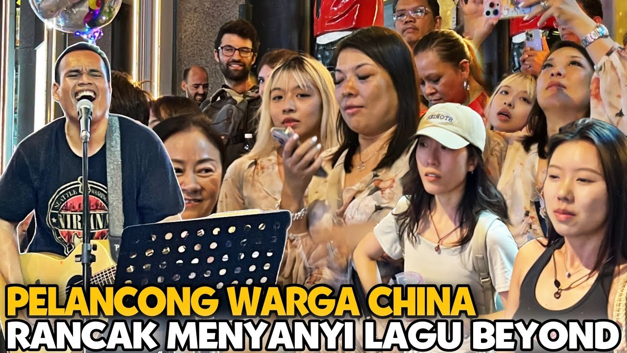 Pelancong China sporting penuh semangat ikut rentak Bob Menyanyi lagu cantonesse