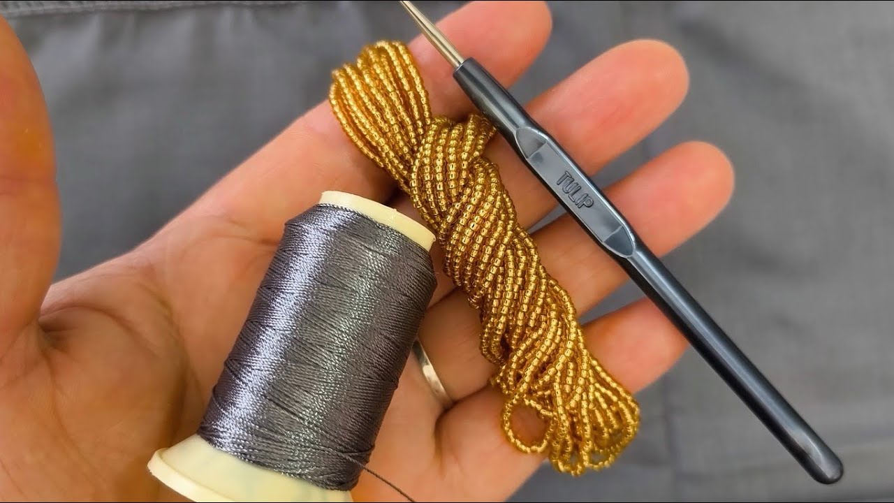 Çok sipariş alan model: Kum boncuklu tığ oyası