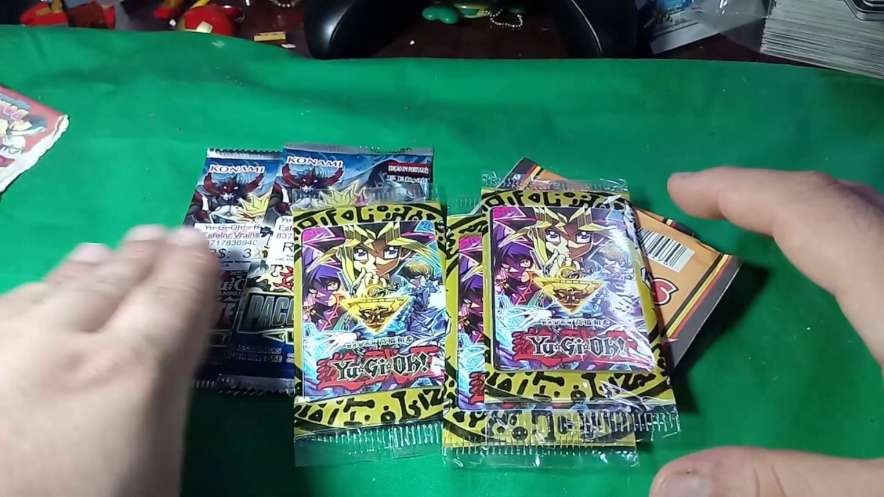 Abrindo vários pacotes de cartas de Yu-Gi-Oh! (Original e de Banca)