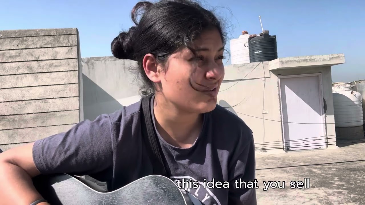 A rooftop cover of 'Running song' by Ellie Nanni