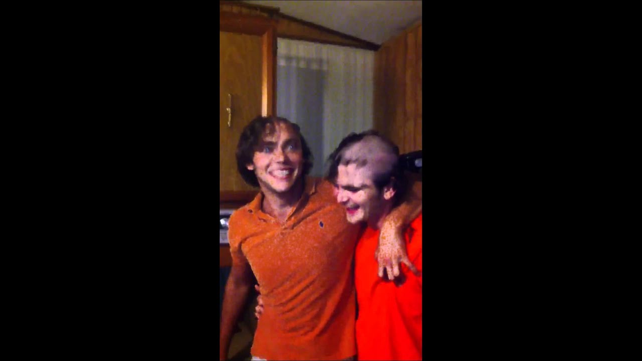 Drunk friends shave their heads