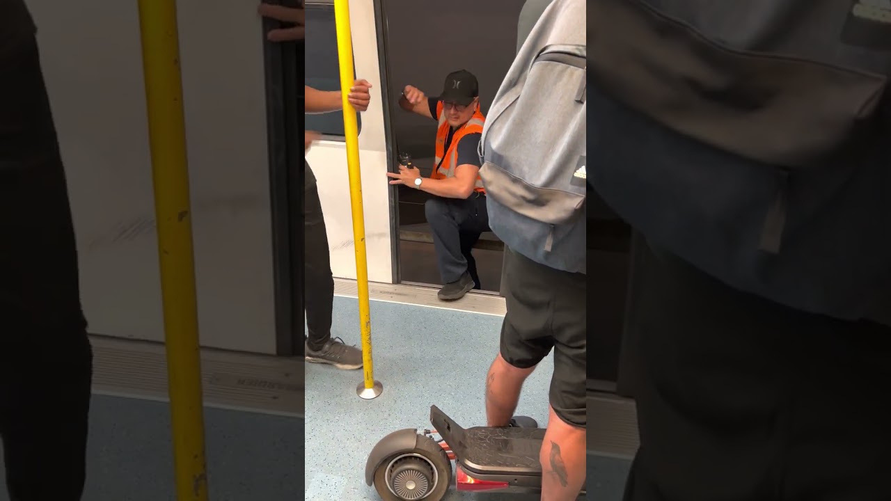 Stuck on Miami Metromover - Person Climbs into our Train!