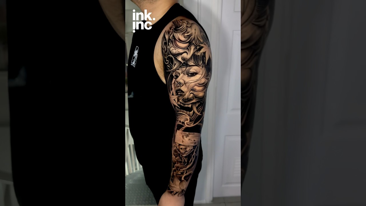 Japanese full sleeve tattoo in black and grey.