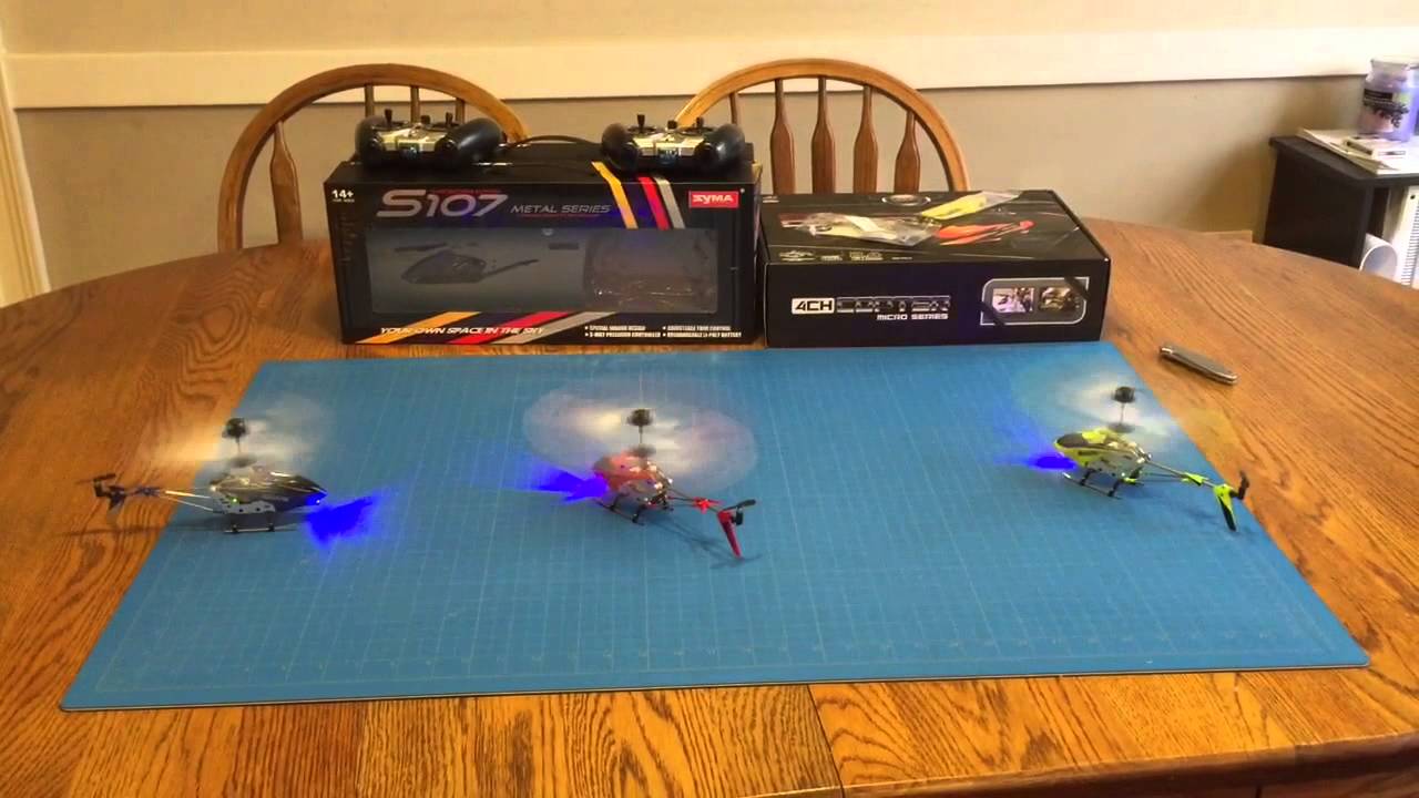 Three Syma S107 RC Helicopters Flying on One Remote
