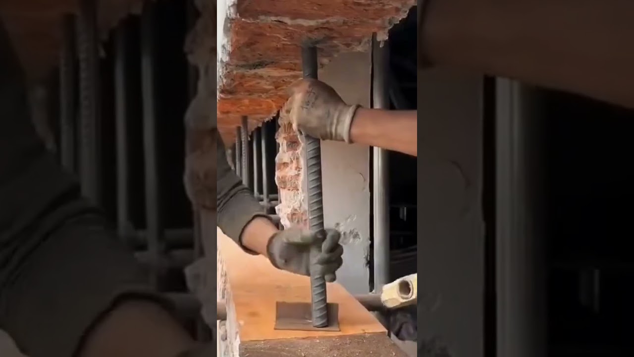 the process of installing iron pillars to support the building 