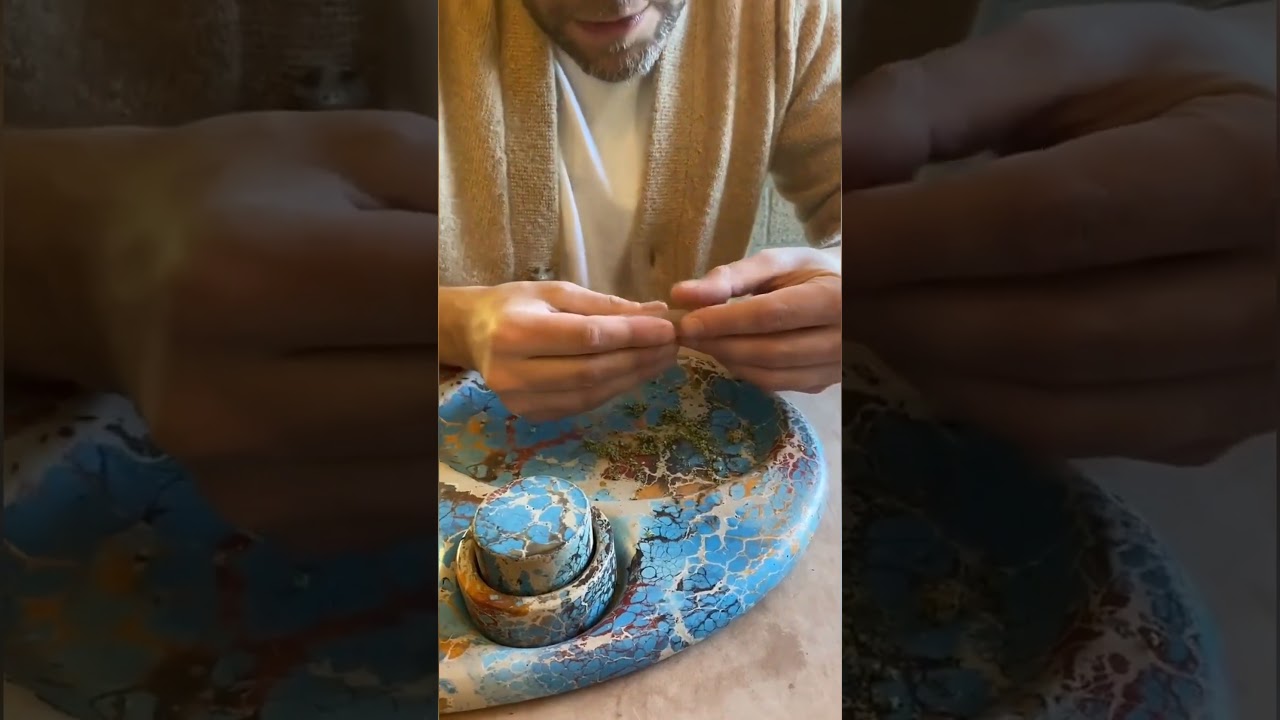 Seth Rogen shows you how to roll a joint
