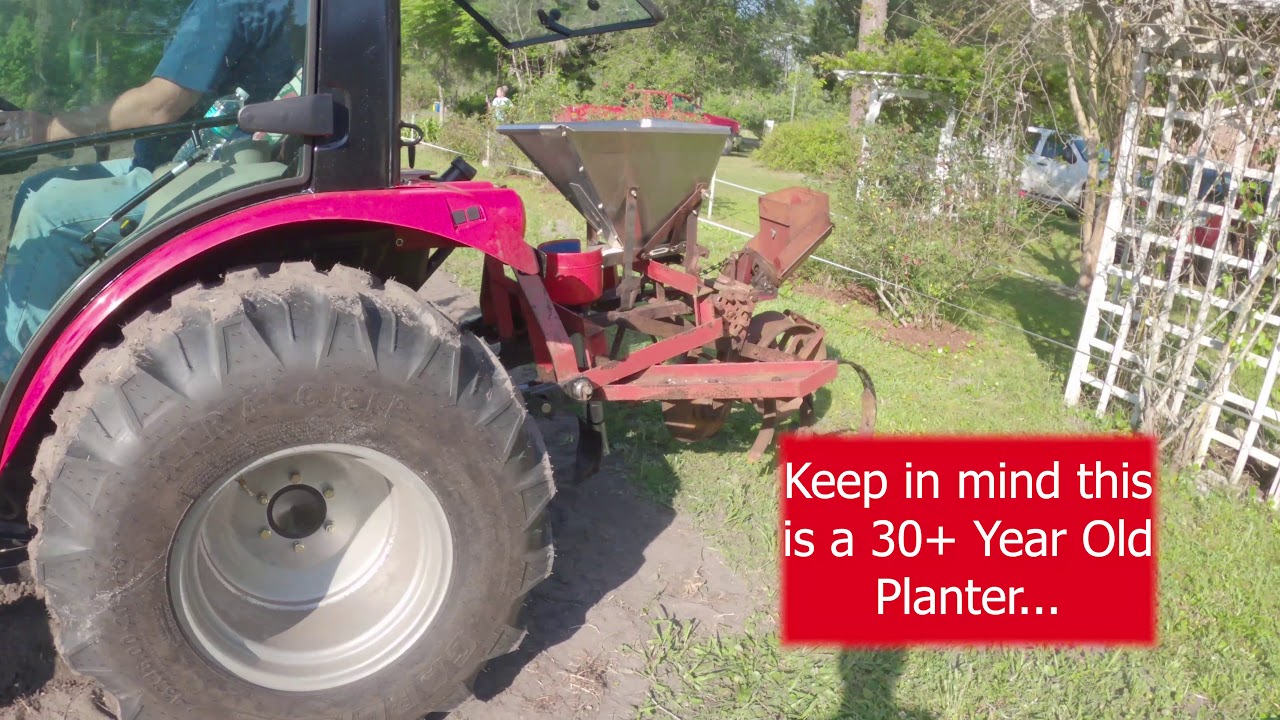 Convington Single Row Planter w/ Weed Rake In Action with TYM T474 Tractor