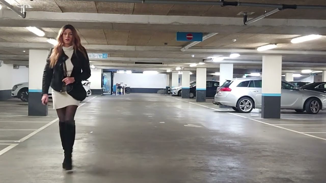 Crossdresser returns shopping cart in white fluffy mini dress and high-heeled boots (8)
