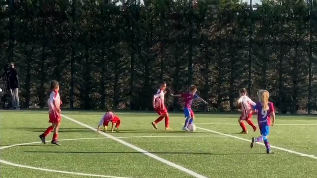FC Barcelona (La Masia) u8 highlight - spectacular goal by 7 year old