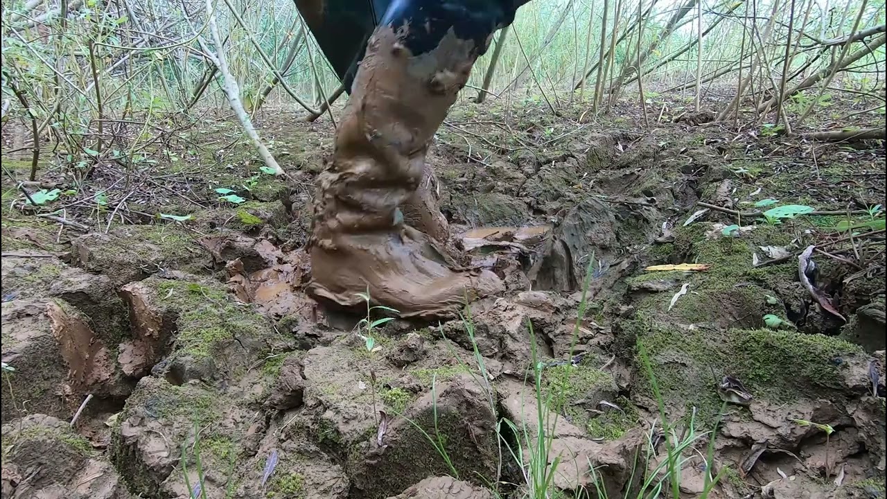 Nora and riding rubber boots in mud 1