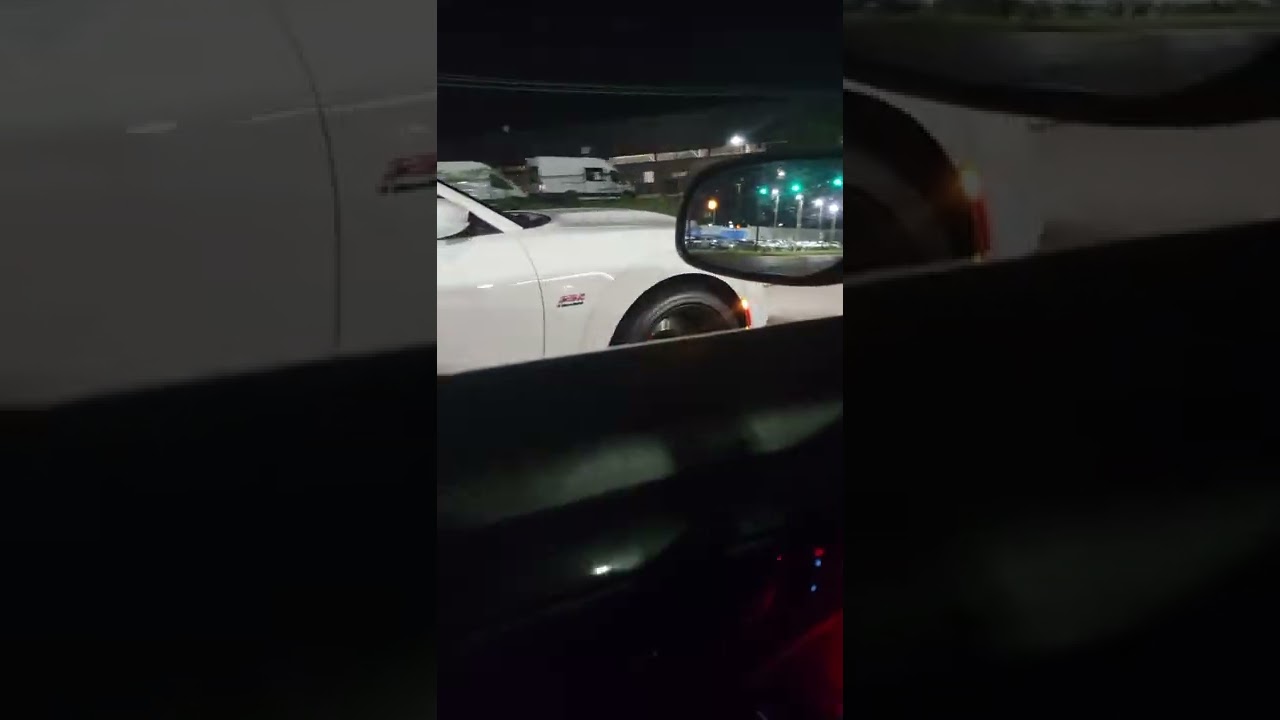 2010 ford taurus SHO vs charger 392 scat pack.
