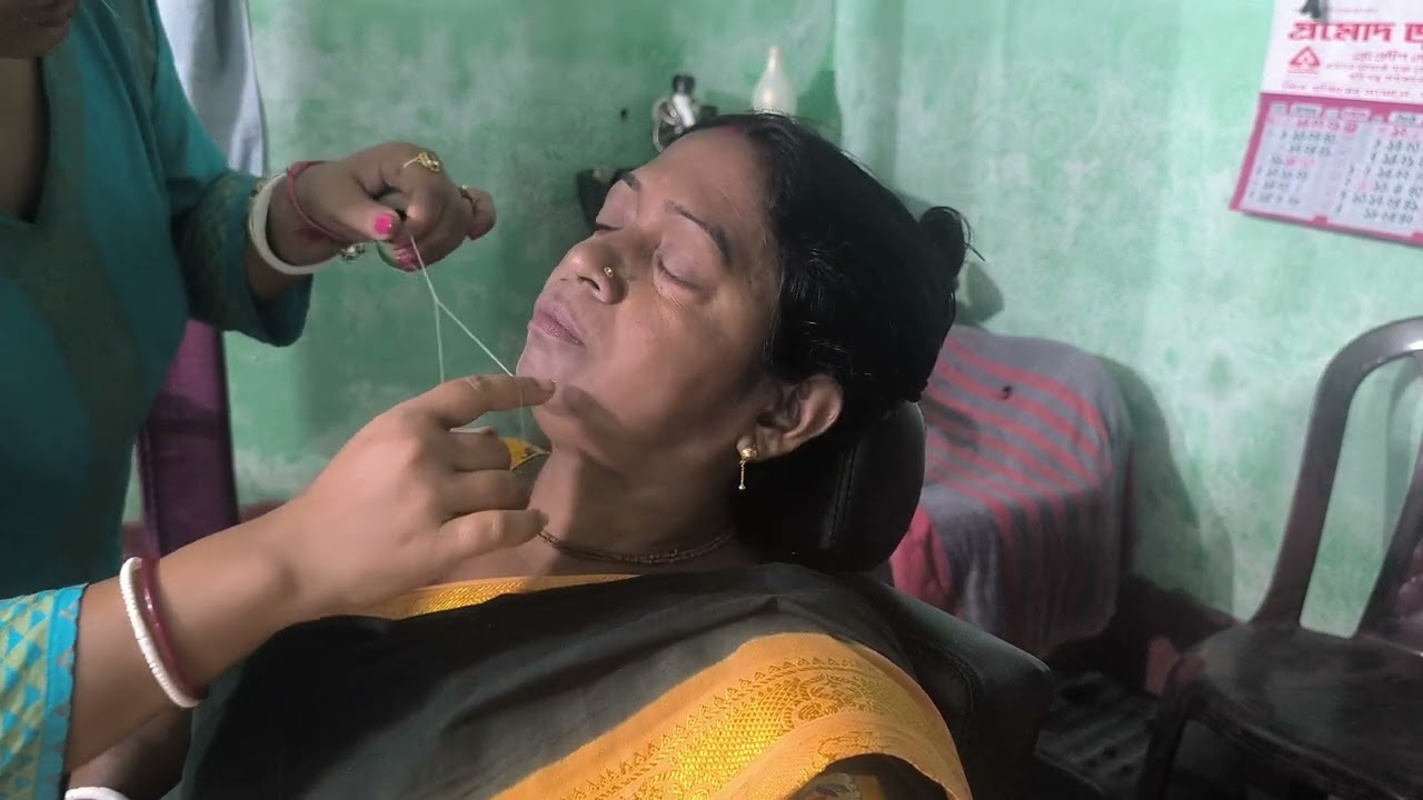 Full face threading in beauty parlour.বিউটি পার্লারে কি ভাবে পুরো মুখের লোম তুলা হয় #eyebrow