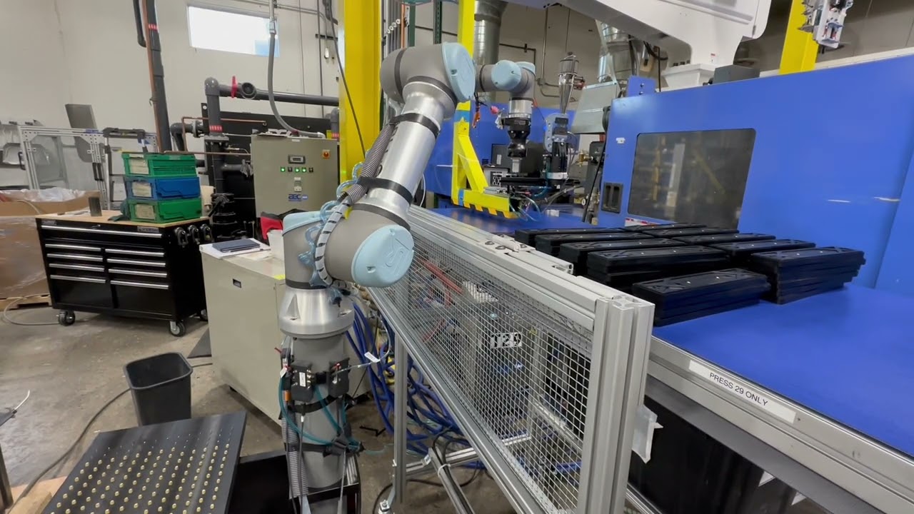 Cobot Assisted Insert Molding