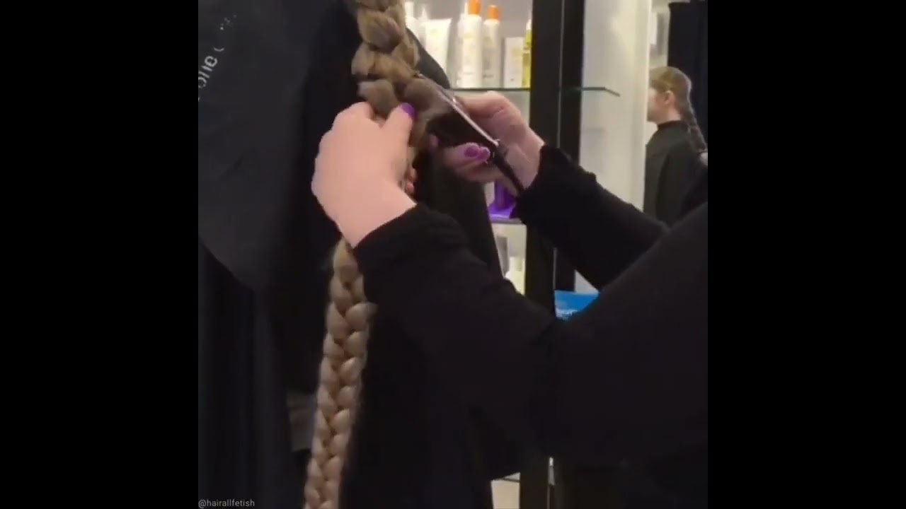 Cutting off at the Braid  ✂️✂️ Its so thick they cut it twice.
