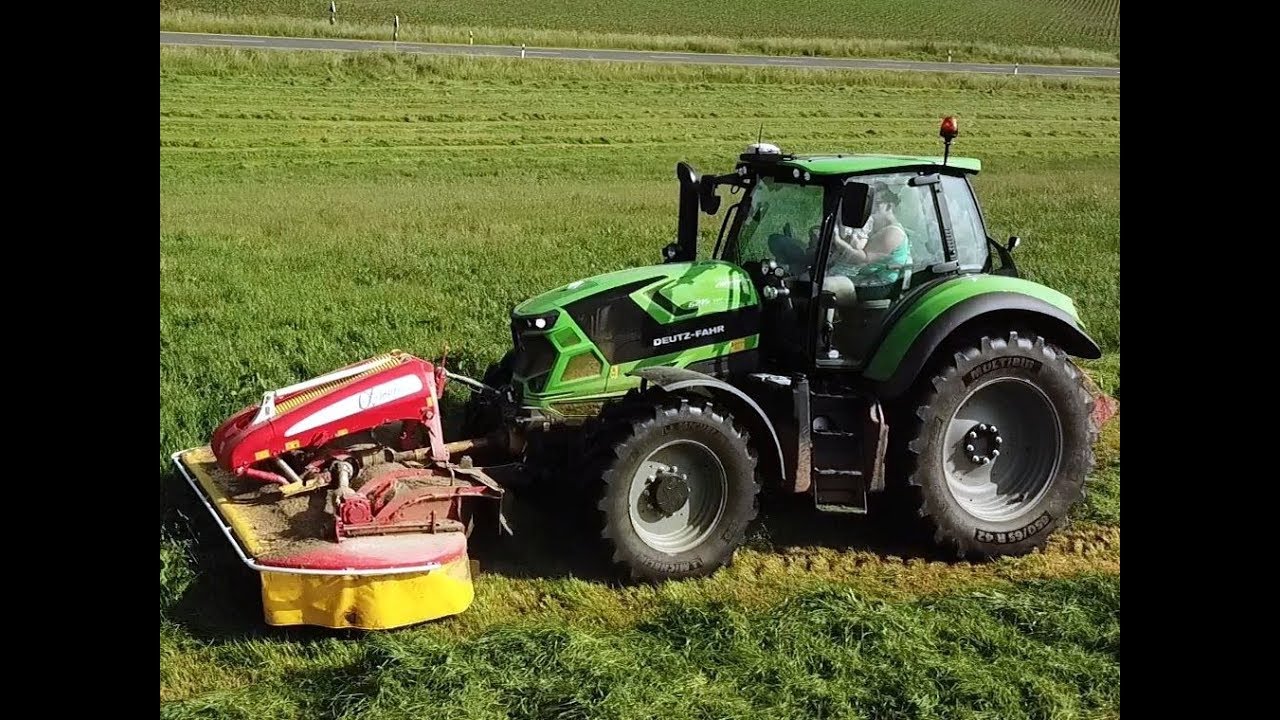 Neuer 6215 TTV von Deutz Fahr mit Pöttinger Alpha Motion im zweiten Schnitt