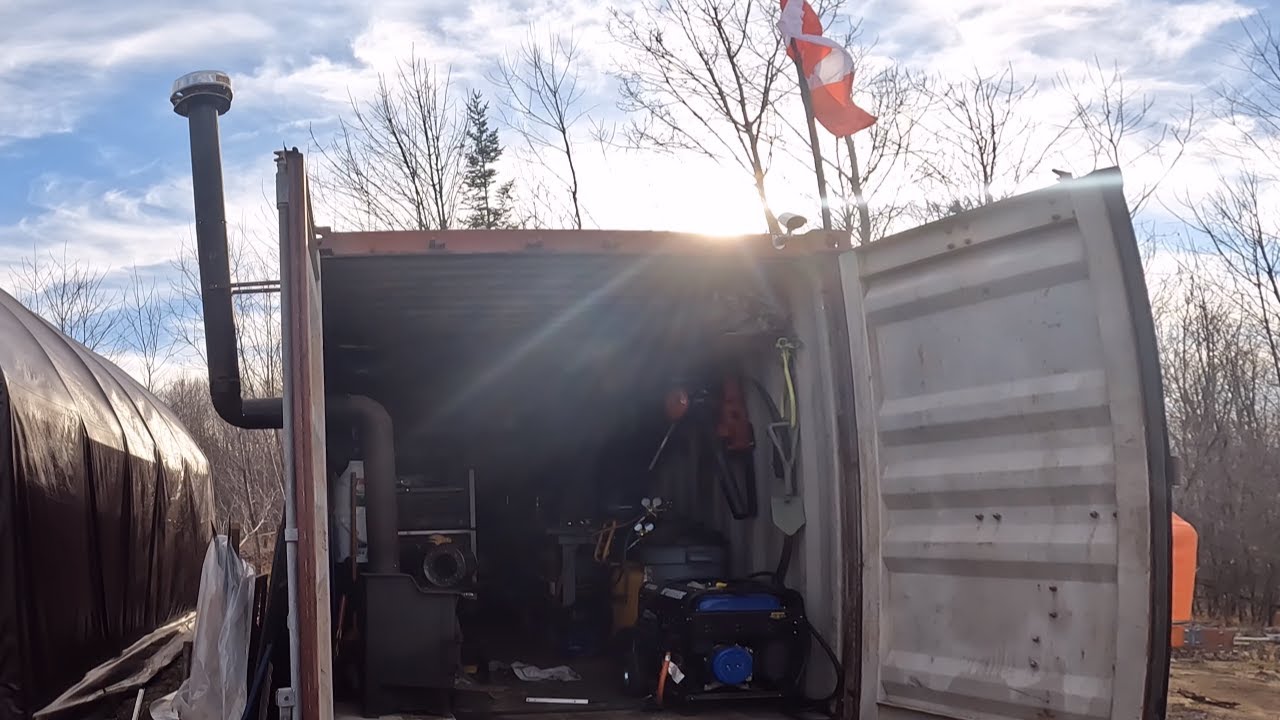 Installing a woodstove in a shipping container shop