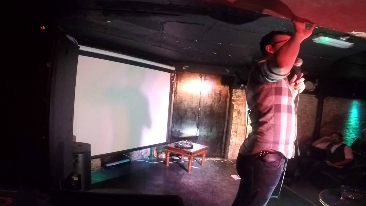 Steve Cross comperes after 9 shots of whiskey