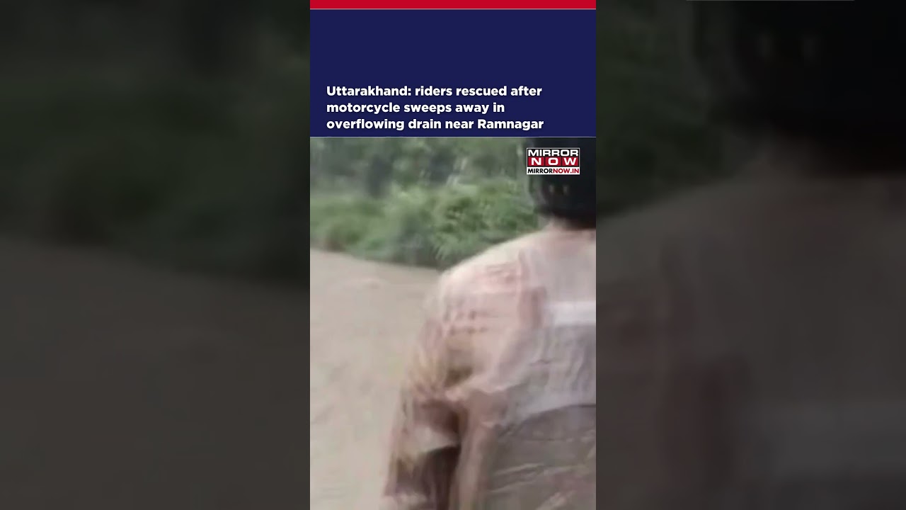 Uttarakhand: Riders Rescued After Motorcycle Sweeps Away In Overflowing Drain Near Ramnagar #shorts