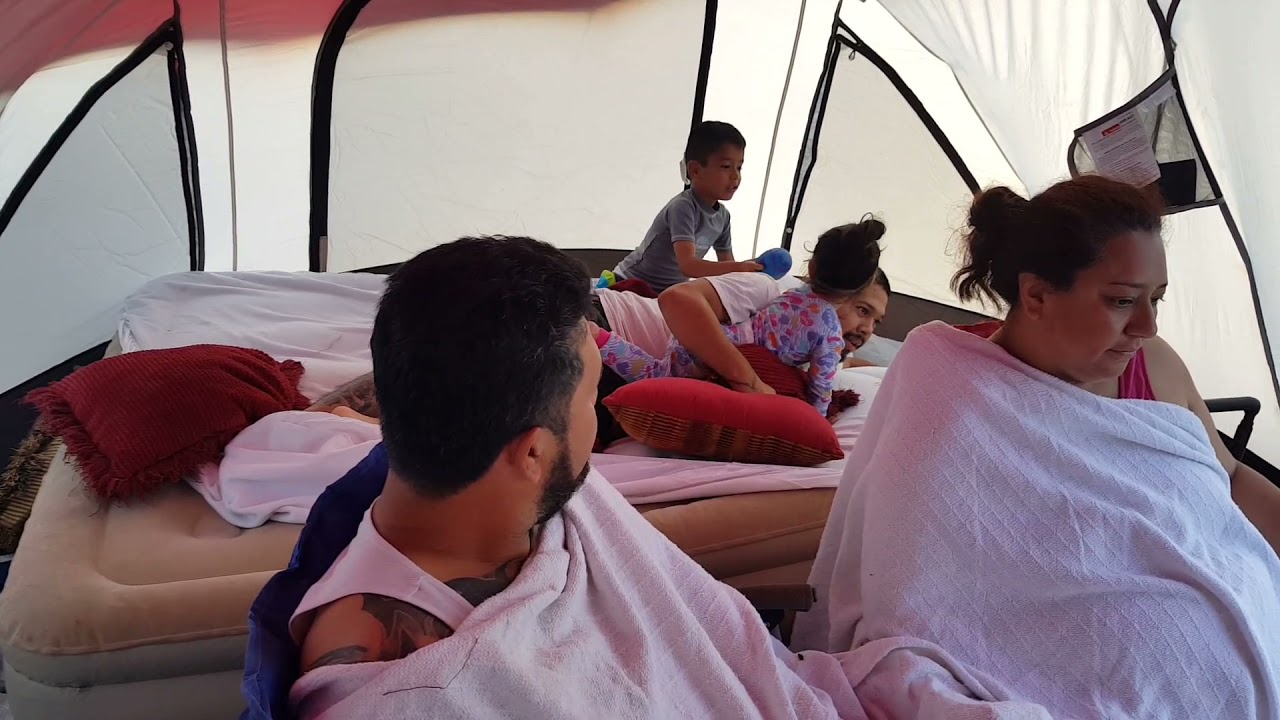 Deflating the mattress at the beach
