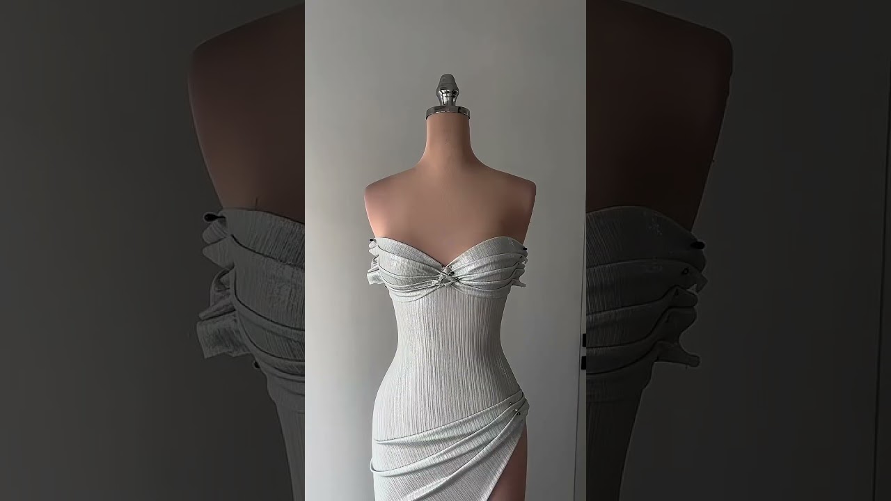 &ldquo;Share with a friend or tag a friend who would shine in this sophisticated silver gown! To order