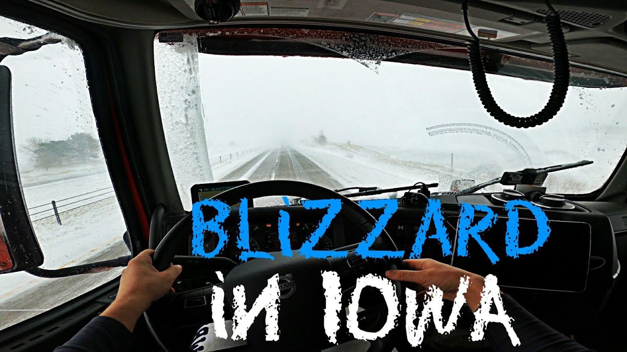 Driving through a blizzard in Iowa. POV. Volvo VNL 860 Globetrotter.