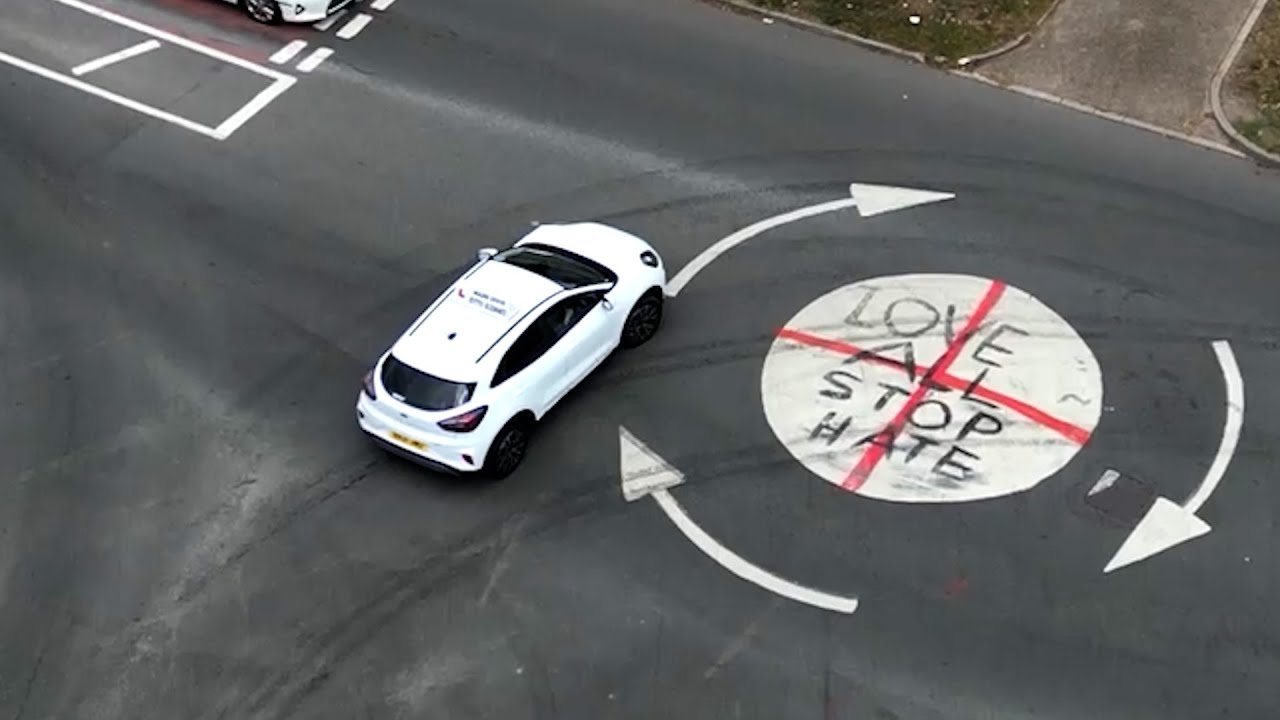 ‘Love All Stop Hate’ painted on Birmingham roundabout amid flag row | SWNS