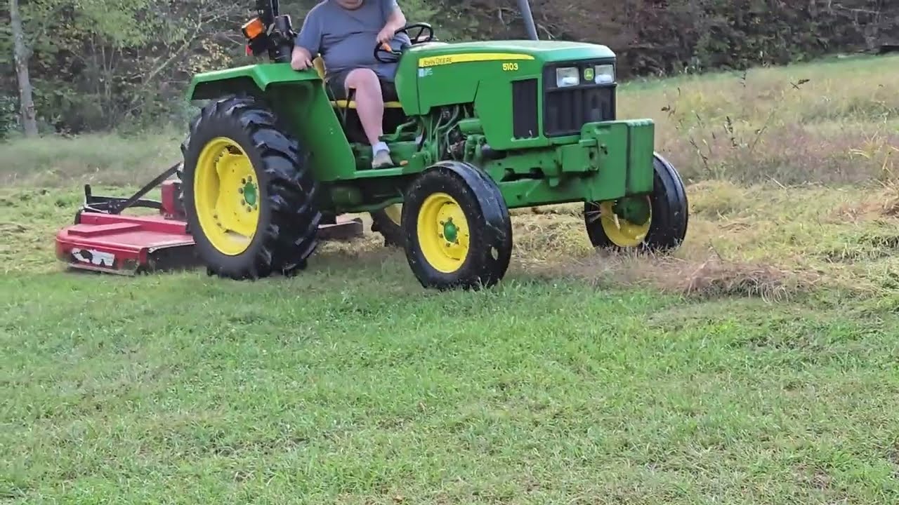 Brush Hogging the Garden with the JD 5103