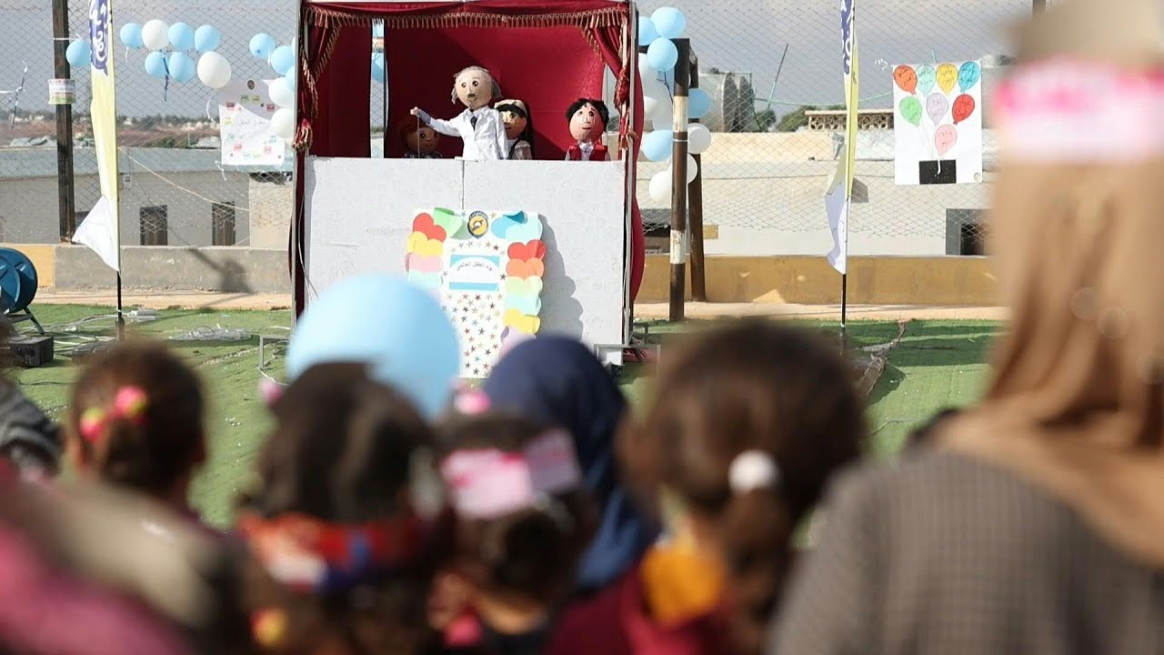 Educational puppet show brings 'smiles and joy' to children in northwest Syria | AFP