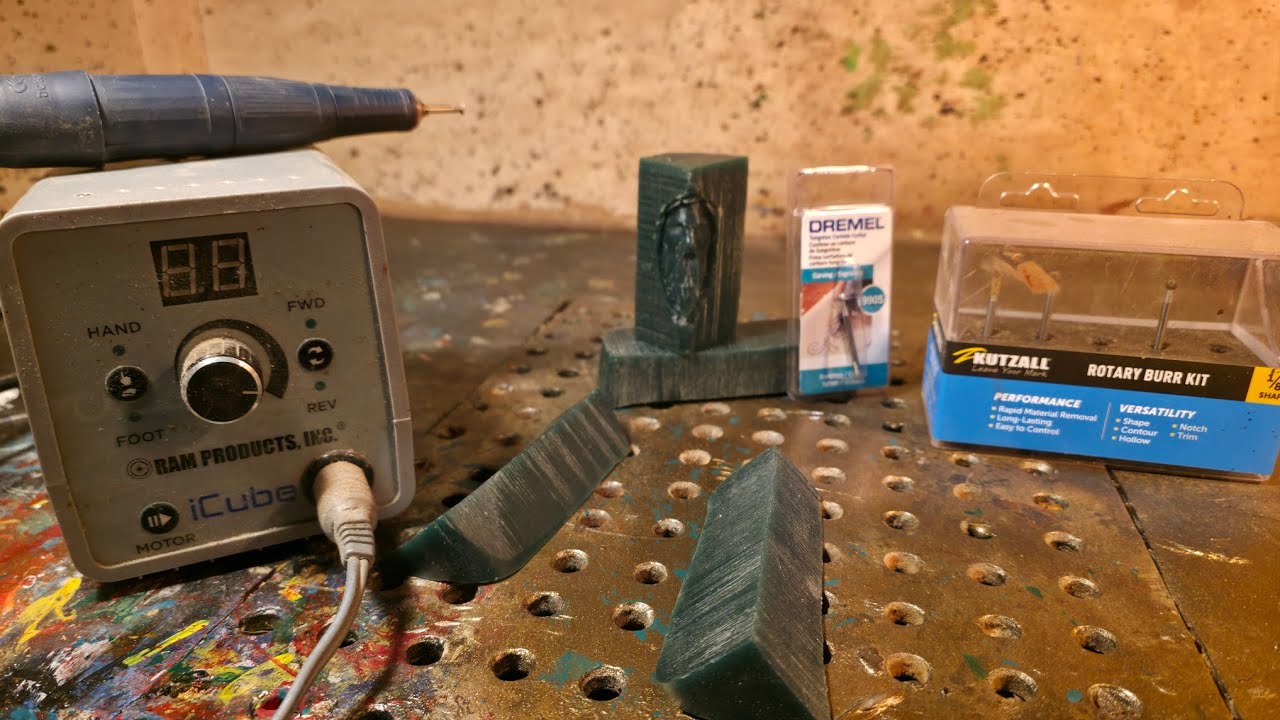 Power carving jewelers wax into spirits for casting.