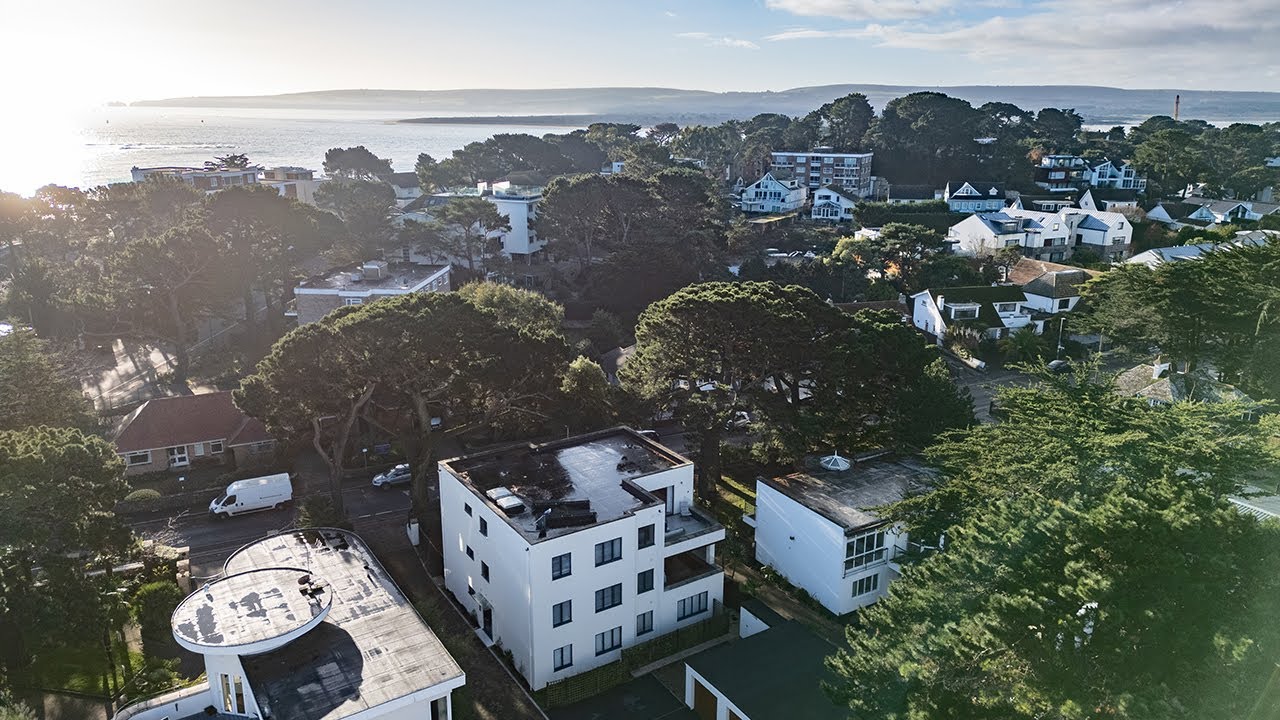 A sophisticated coastal home where harbour sunsets take centre stage