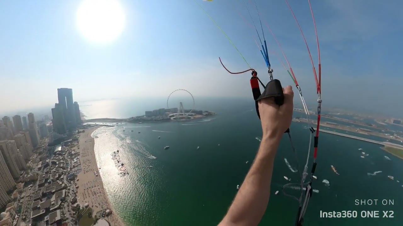Paragliding: urban hike and fly race in dubai: skyscraper cobra take off