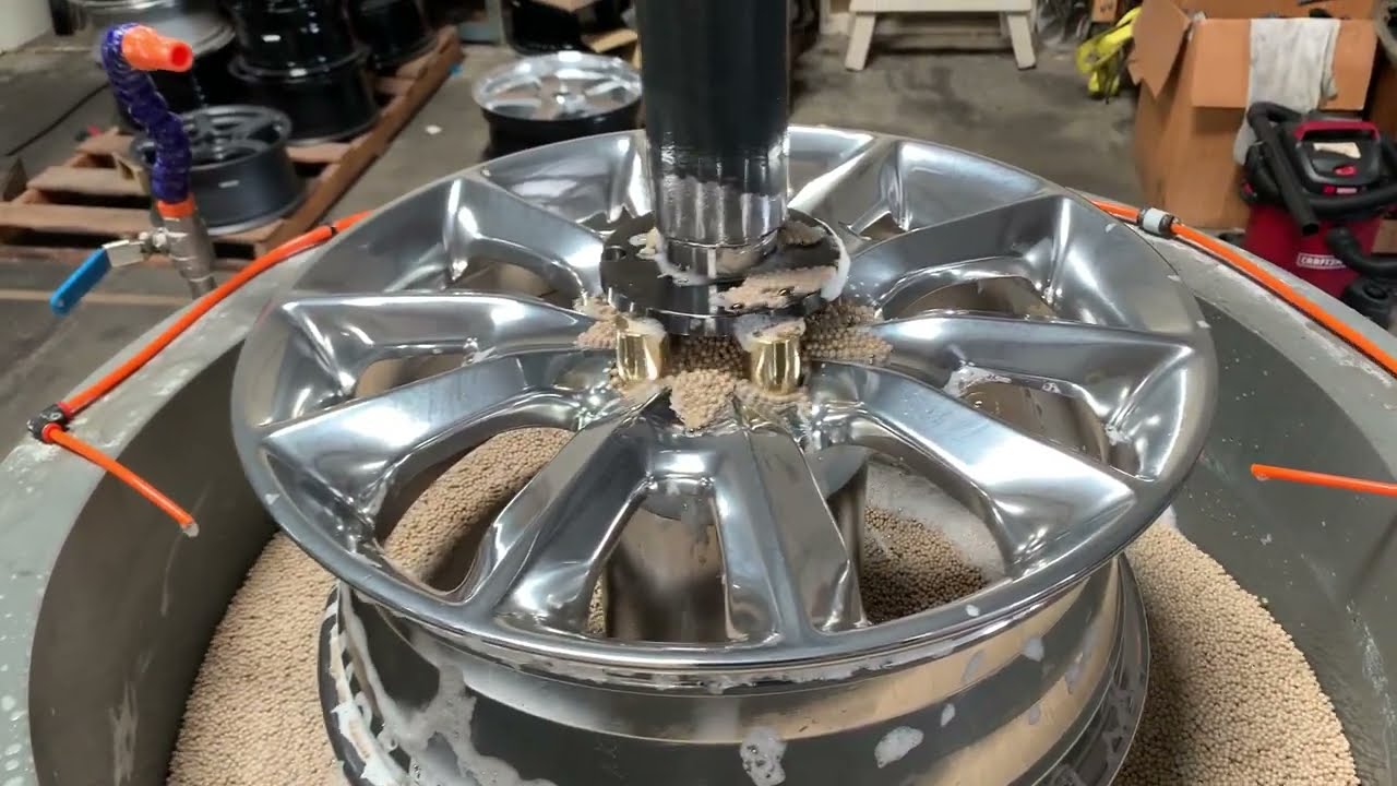 Vibratory Aluminum Wheel Polisher.  Load and Unload without removing media.
