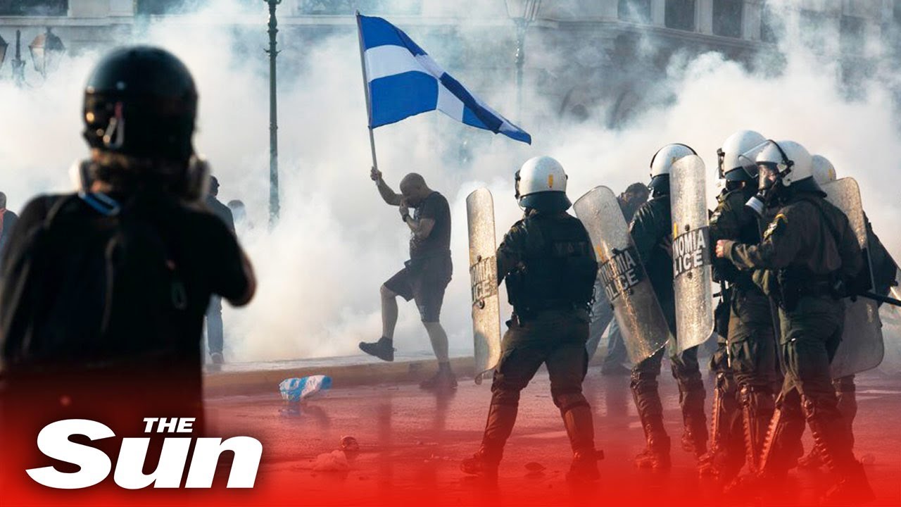 Police fire tear gas & water cannon anti-vax protesters in Greece