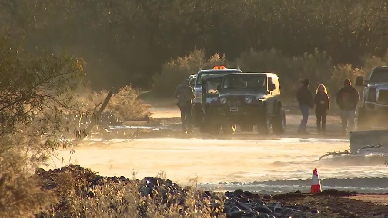 2 children dead, 1 missing after flash floods sweep car
