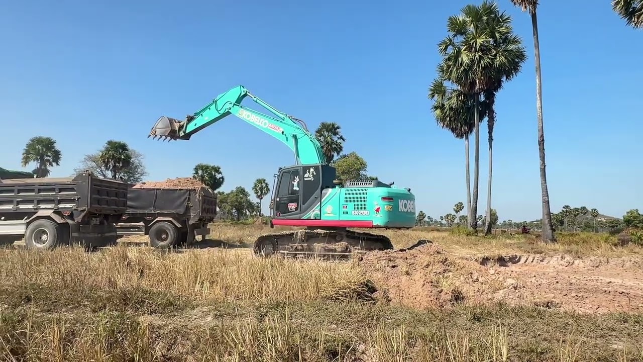 heavy equipment operators have difficulty unloading large stones at sand mining sites #xcavator