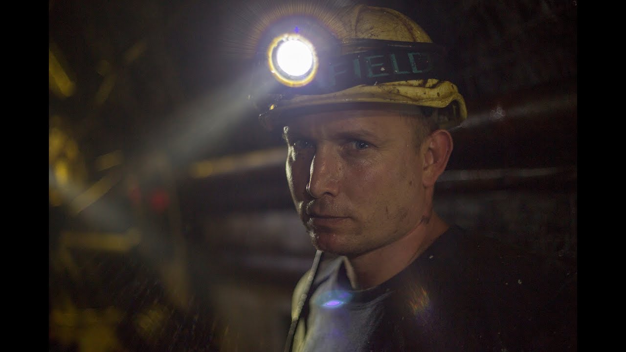 How can workers be protected from natural radiation?