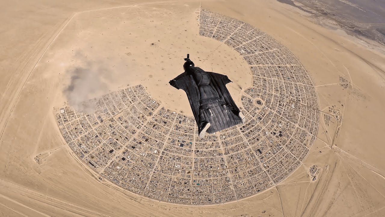 Flying Into Burning Man In A Wingsuit