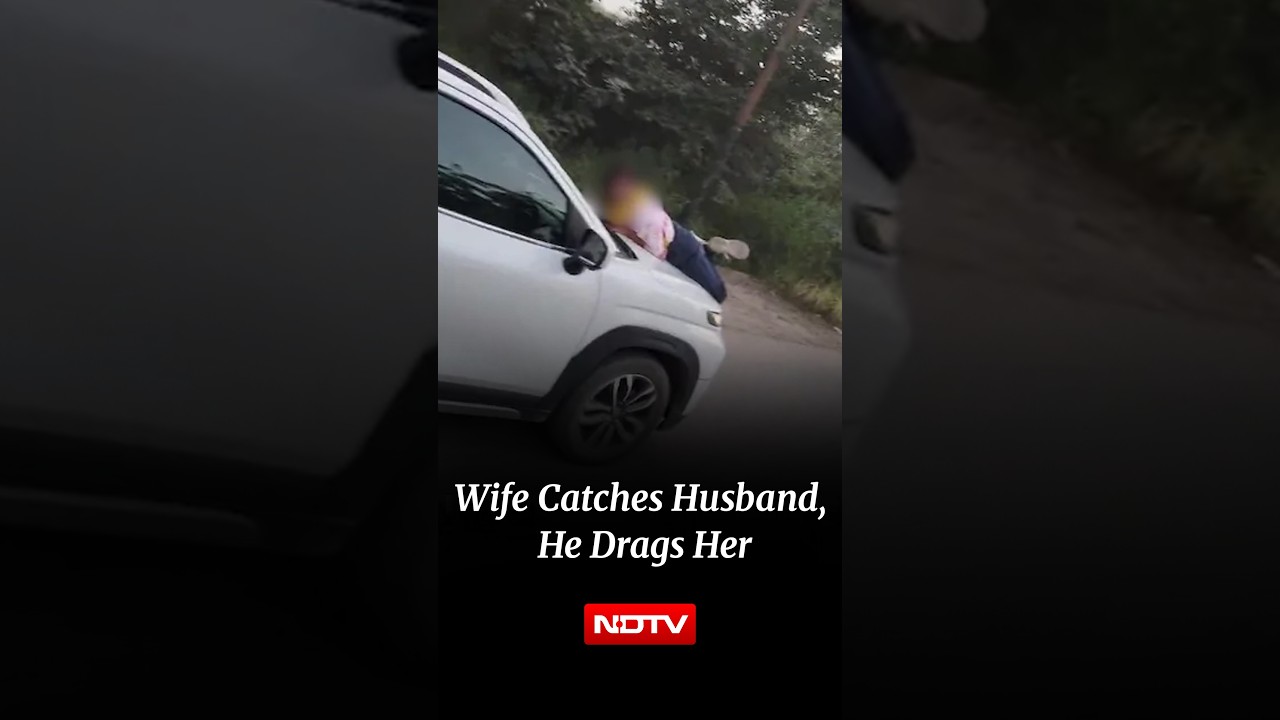 Woman Catches Husband Eating Momo With Girlfriend, He Drags Her On Car Bonnet
