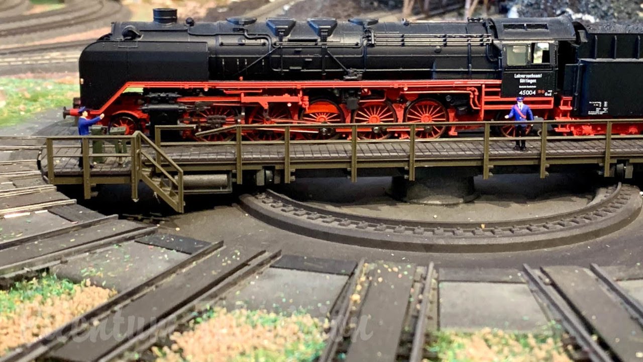 Поезда на красивом макете железной дороги от Märklin