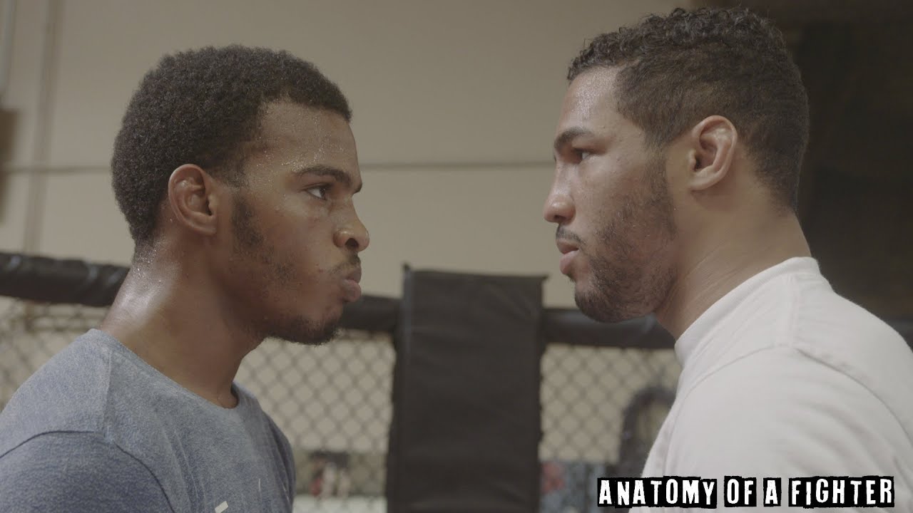 Kevin Lee coaches his brother Keith Lee in a sparring session with Joseph Benavidez