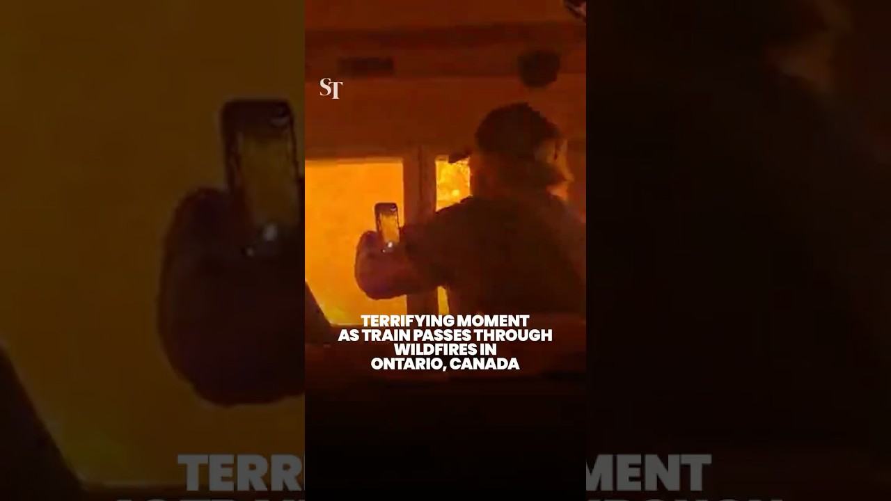 Terrifying moment as train passes through forest fires in Ontario