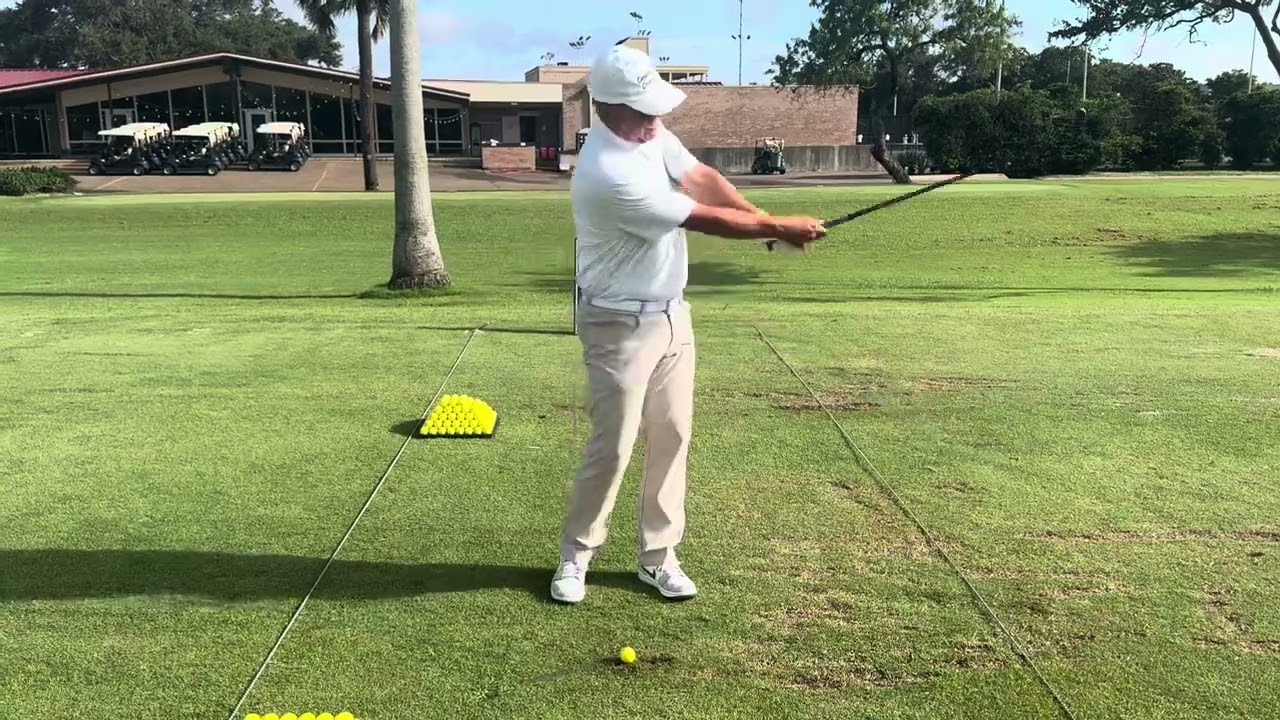 Brent Blackburn uses a tee to check his grip