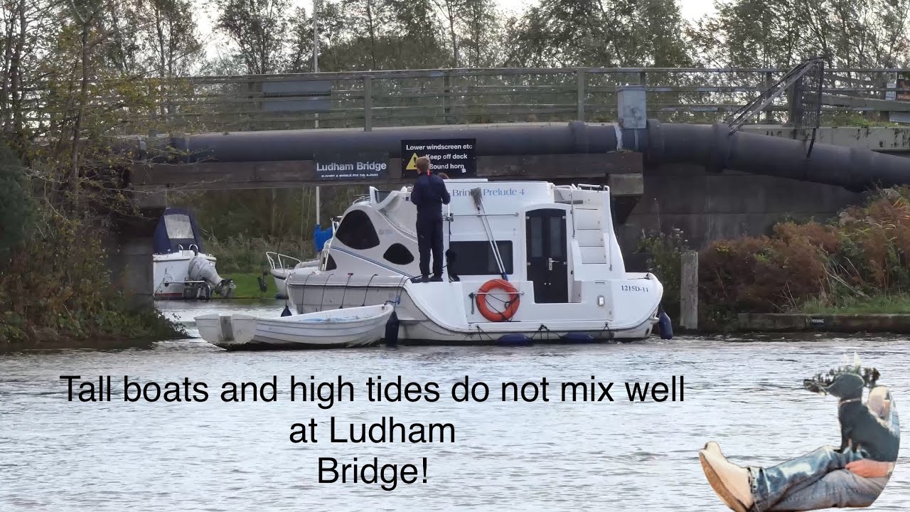 Tall boats and high tides do not mix well at Ludham Bridge! 
