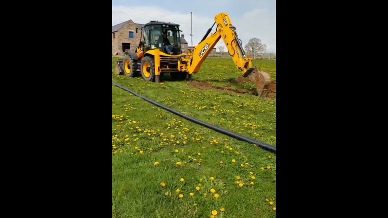 JCB 4cx digging drainage trench,SG Plant Services Derbyshire