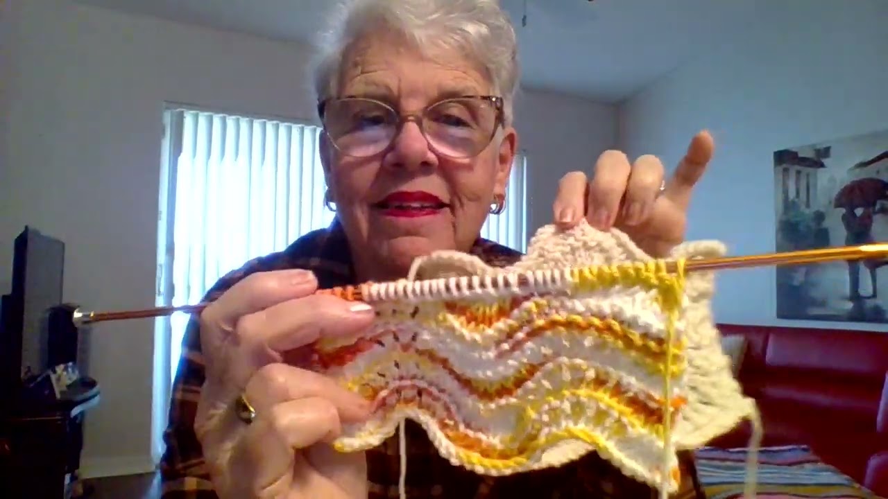 Punto abanico a dos agujas.