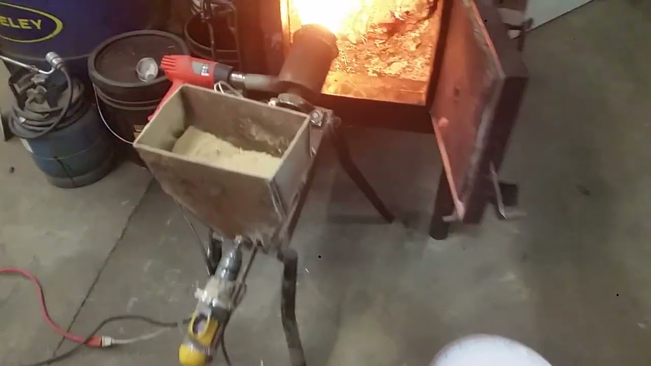 Sawdust burner with hopper