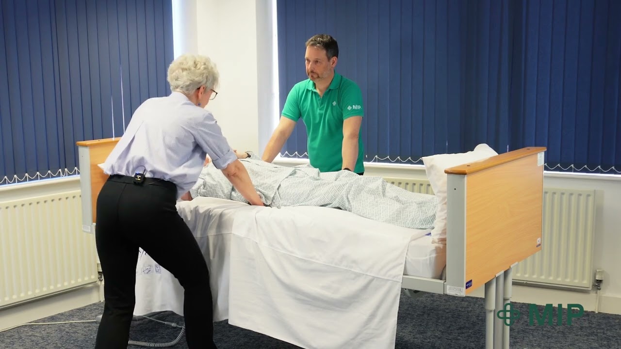 Turning a Patient onto Side Technique Using an In-Bed Repositioning System (2 Persons)