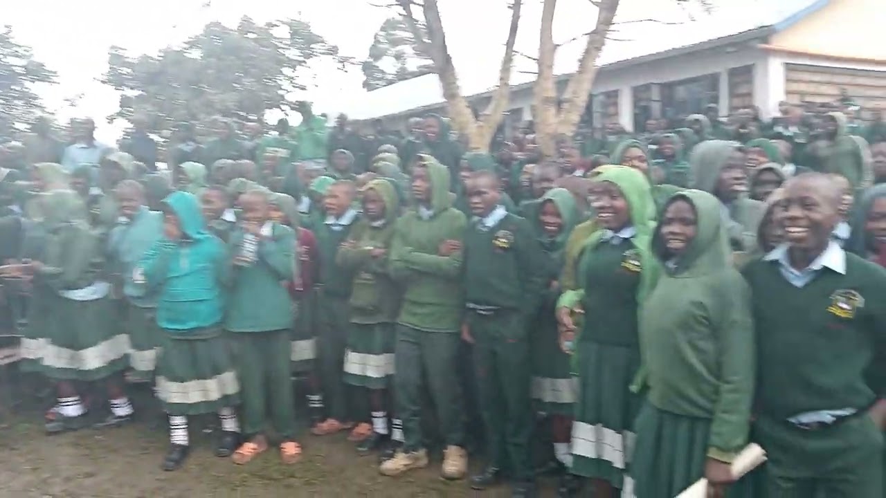EVANS BETT PRESENTING A SONG, RALLY– KAMUREITO HIGH SCHL. APRIL 2023.