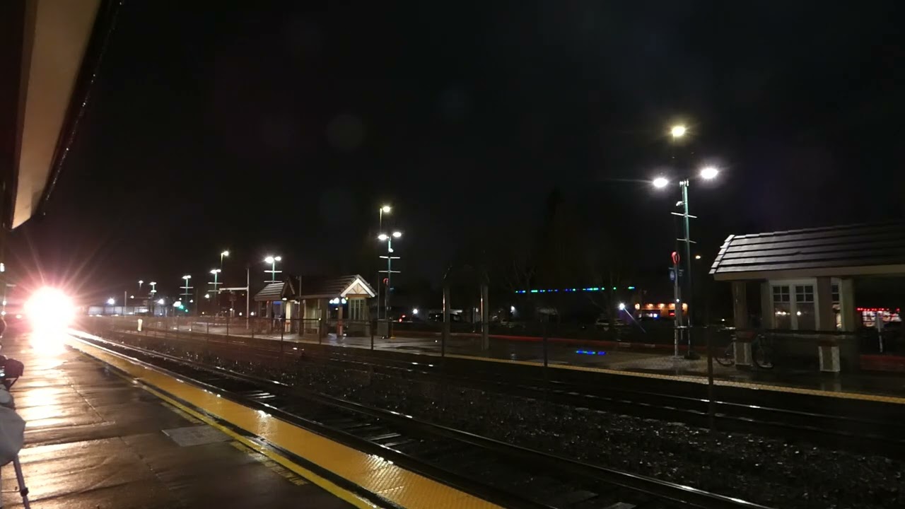 (Northbound) BNSF Empty Grain Train passes through the Puyallup Station.