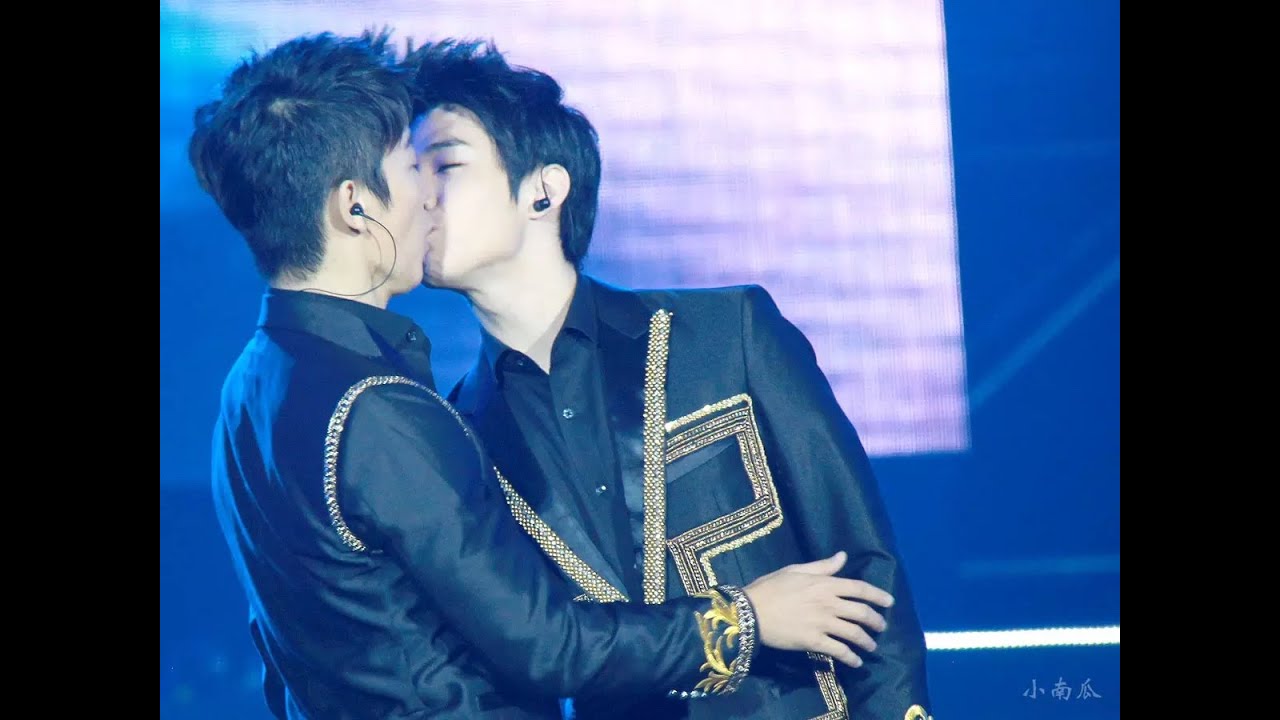 Henry trying to kiss Donghae